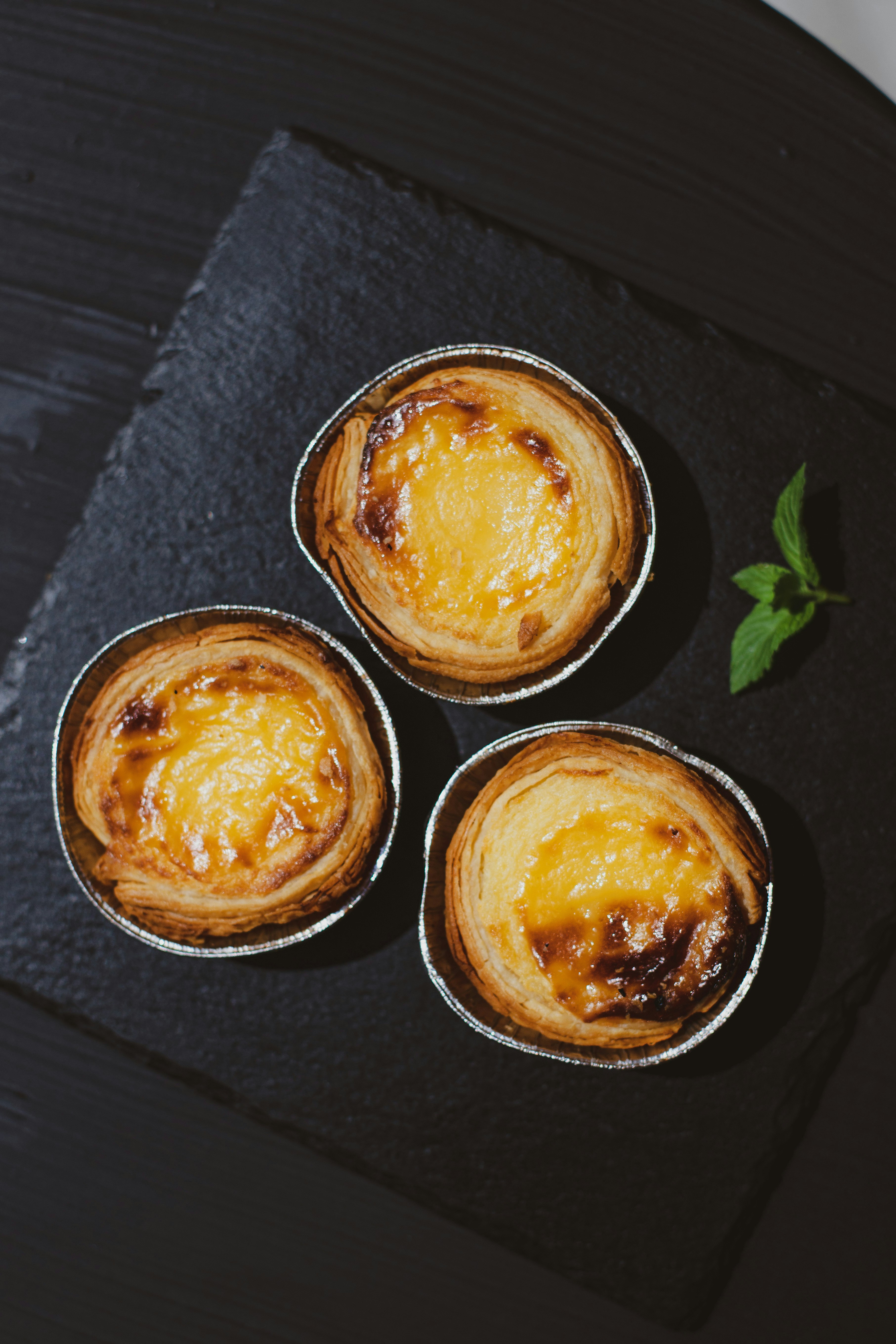 Golden flaky egg tarts fresh from the oven